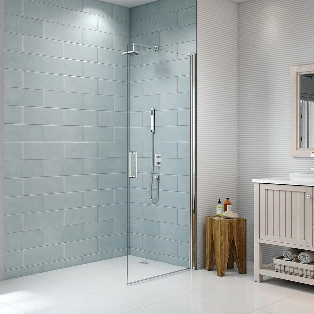 Modern bathroom with a glass shower screen and minimalist decor.